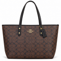 Brown Coach Signature Canvas Tote Bag with Black Trim and Gold Details